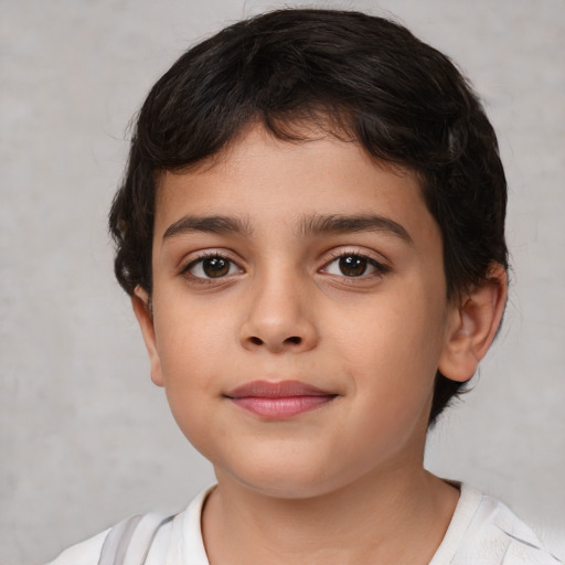 Joyful white child female with short  brown hair and brown eyes