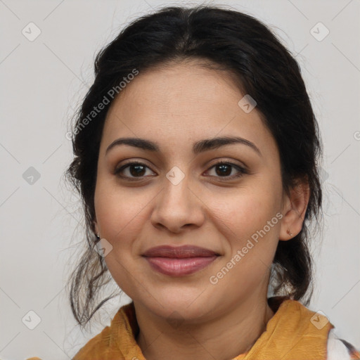 Joyful latino young-adult female with medium  brown hair and brown eyes