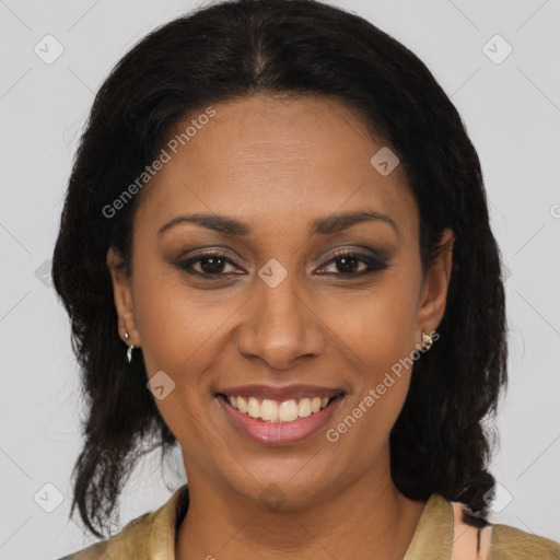 Joyful latino young-adult female with medium  brown hair and brown eyes
