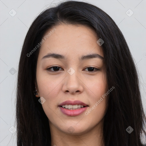 Joyful asian young-adult female with long  brown hair and brown eyes