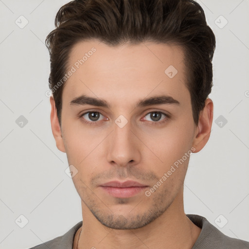 Neutral white young-adult male with short  brown hair and brown eyes