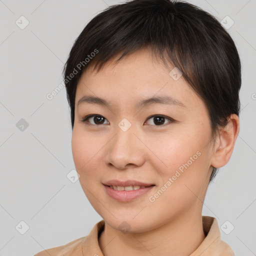 Joyful asian young-adult female with short  brown hair and brown eyes