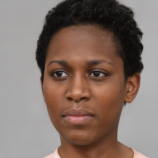 Neutral black young-adult female with short  black hair and brown eyes