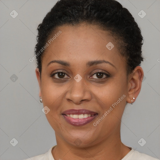 Joyful latino adult female with short  brown hair and brown eyes