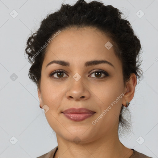 Joyful latino young-adult female with short  brown hair and brown eyes