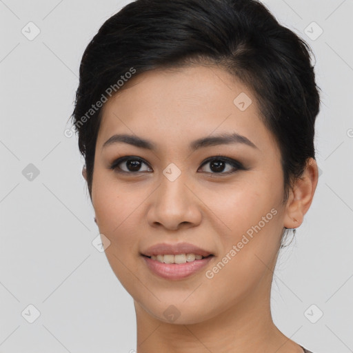 Joyful asian young-adult female with long  brown hair and brown eyes