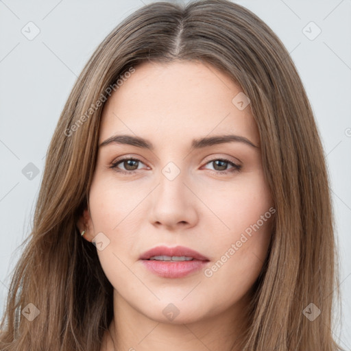 Neutral white young-adult female with long  brown hair and brown eyes