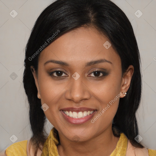 Joyful latino young-adult female with medium  brown hair and brown eyes