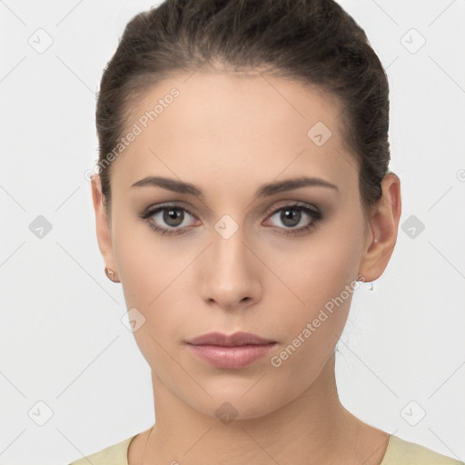 Neutral white young-adult female with short  brown hair and brown eyes