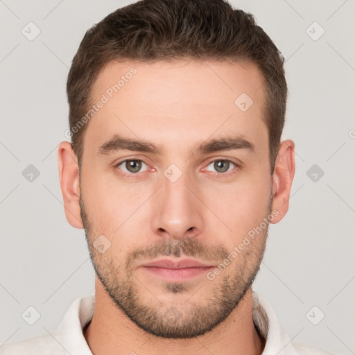 Neutral white young-adult male with short  brown hair and brown eyes