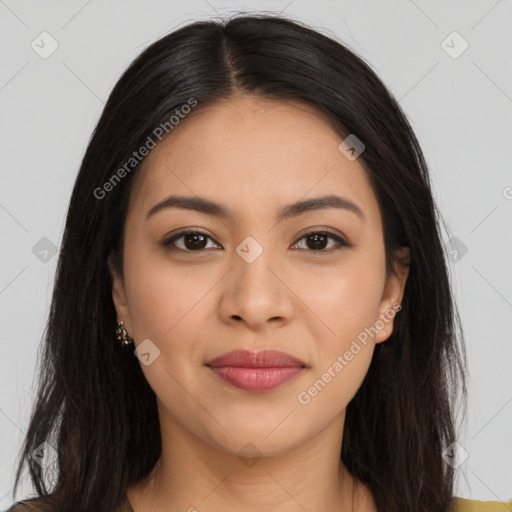 Joyful latino young-adult female with long  brown hair and brown eyes