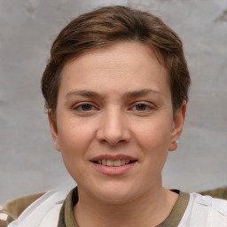 Joyful white young-adult female with short  brown hair and grey eyes