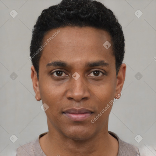 Joyful black young-adult male with short  black hair and brown eyes