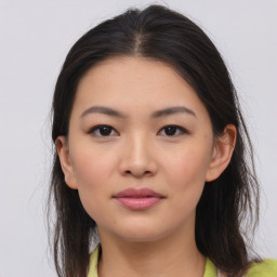 Joyful asian young-adult female with medium  brown hair and brown eyes