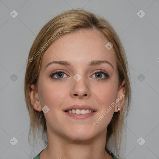 Joyful white young-adult female with medium  brown hair and blue eyes