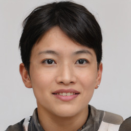 Joyful asian young-adult female with short  brown hair and brown eyes