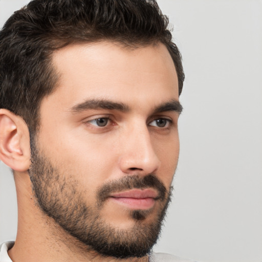 Neutral white young-adult male with short  brown hair and brown eyes