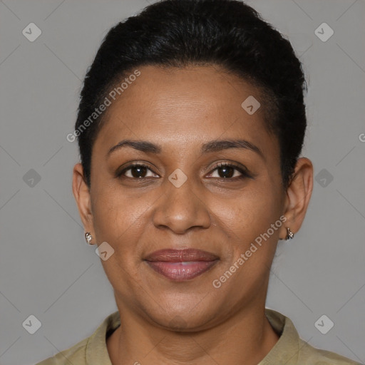 Joyful black adult female with short  brown hair and brown eyes