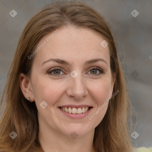 Joyful white adult female with long  brown hair and brown eyes