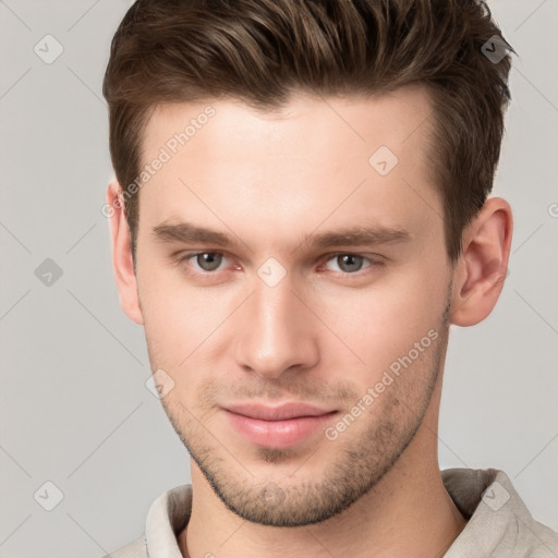 Neutral white young-adult male with short  brown hair and brown eyes