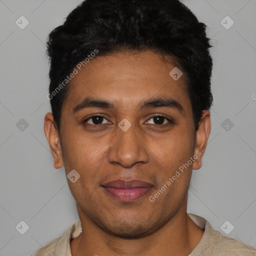 Joyful latino young-adult male with short  black hair and brown eyes