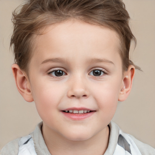 Joyful white child female with short  brown hair and brown eyes