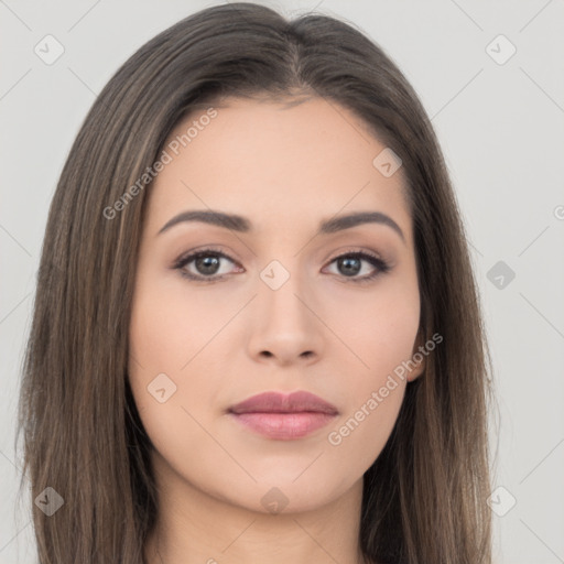 Neutral white young-adult female with long  brown hair and brown eyes