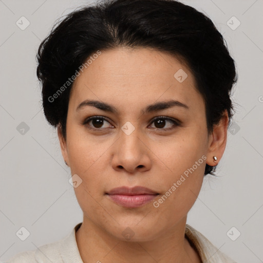 Joyful latino young-adult female with short  brown hair and brown eyes