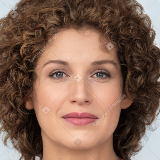 Joyful white young-adult female with medium  brown hair and green eyes