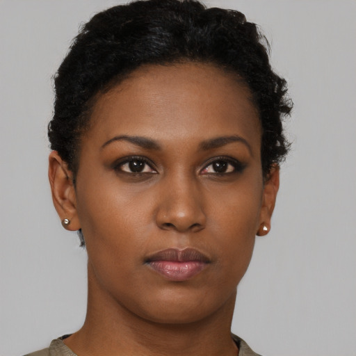 Neutral black young-adult female with short  brown hair and brown eyes