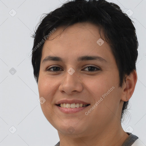 Joyful white young-adult female with short  brown hair and brown eyes