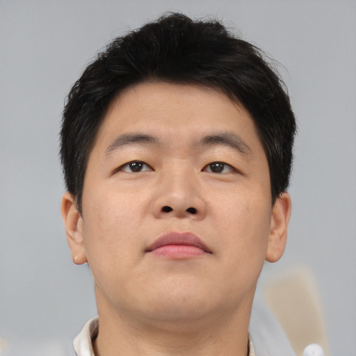 Neutral asian young-adult male with short  brown hair and brown eyes