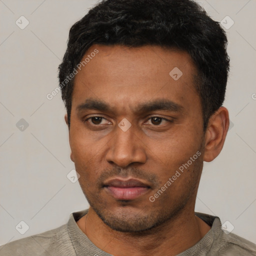 Neutral latino young-adult male with short  black hair and brown eyes