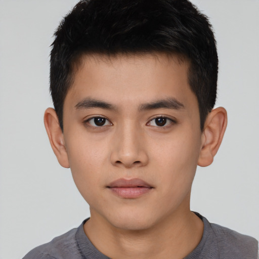 Neutral asian child male with short  black hair and brown eyes