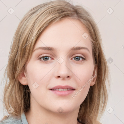 Joyful white young-adult female with medium  brown hair and blue eyes