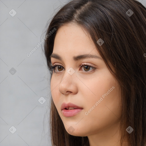 Neutral white young-adult female with long  brown hair and brown eyes