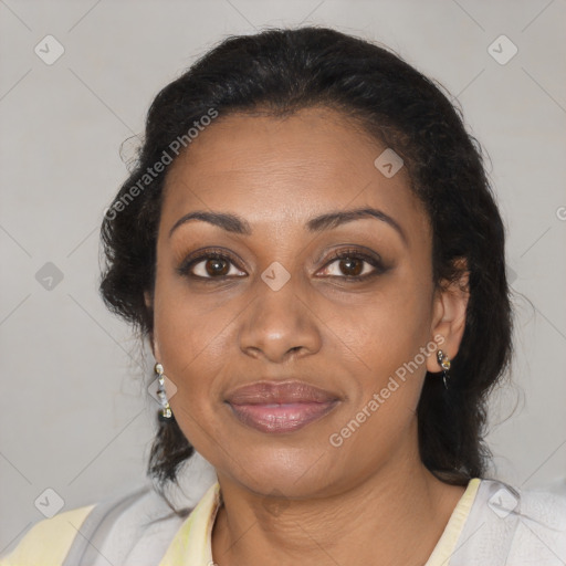 Joyful black adult female with medium  brown hair and brown eyes