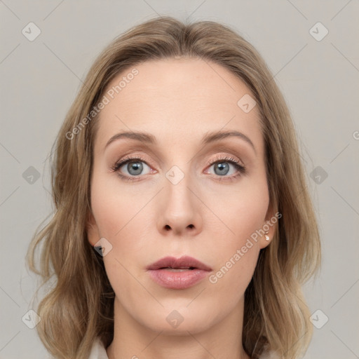 Neutral white young-adult female with medium  brown hair and grey eyes