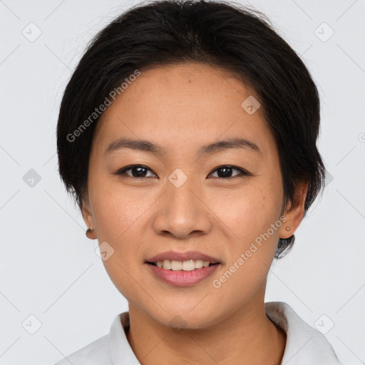 Joyful asian young-adult female with short  brown hair and brown eyes