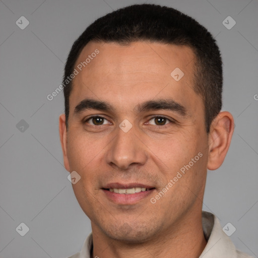 Joyful white young-adult male with short  brown hair and brown eyes