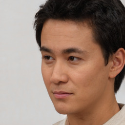 Neutral white young-adult male with short  black hair and brown eyes