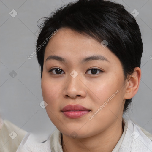 Joyful asian young-adult female with medium  brown hair and brown eyes