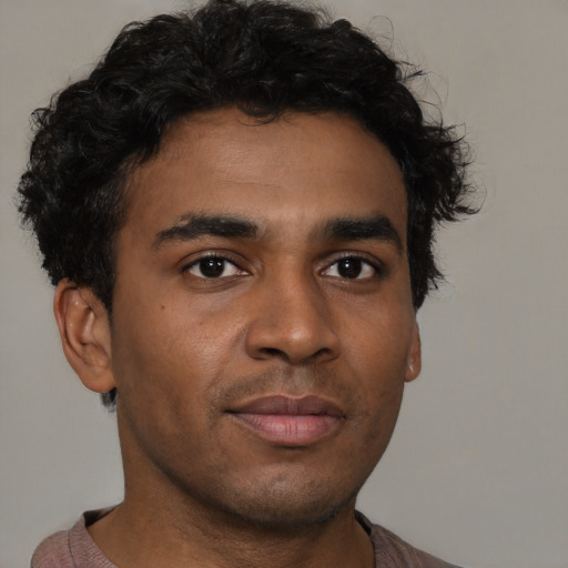 Neutral latino young-adult male with short  brown hair and brown eyes