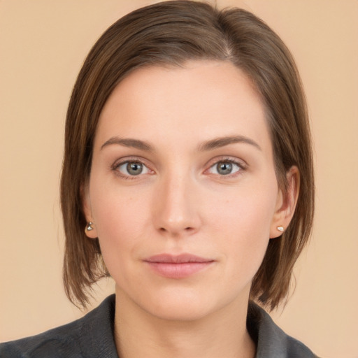 Neutral white young-adult female with medium  brown hair and grey eyes