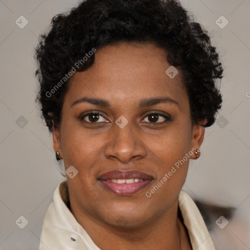 Joyful black young-adult female with short  brown hair and brown eyes