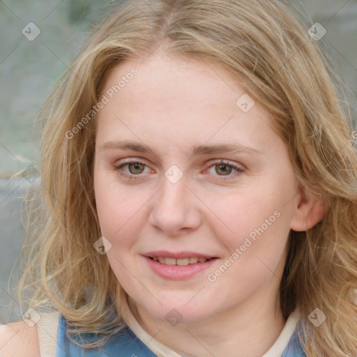 Joyful white young-adult female with medium  brown hair and blue eyes