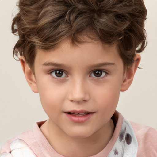 Joyful white child male with short  brown hair and brown eyes