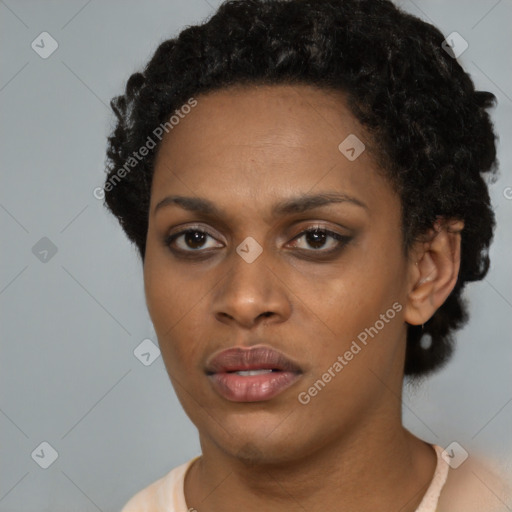 Neutral black young-adult female with short  black hair and brown eyes