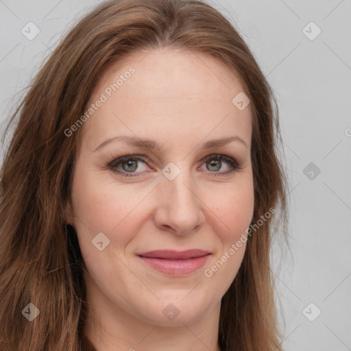 Joyful white young-adult female with long  brown hair and green eyes