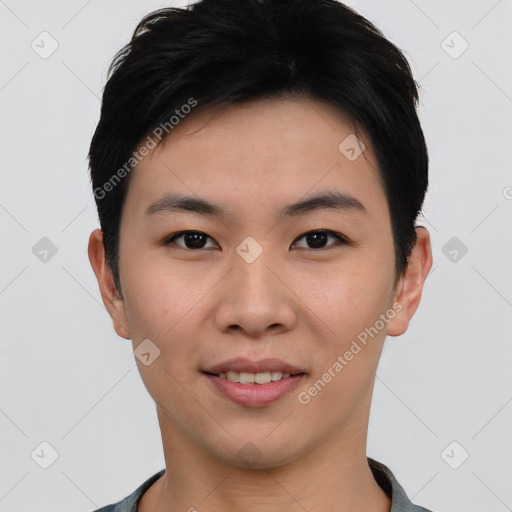 Joyful asian young-adult male with short  black hair and brown eyes